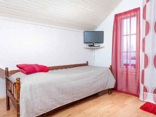 TurusenSaha Guesthouse : photo 4 de la chambre chambre lits jumeaux deluxe - vue sur mer