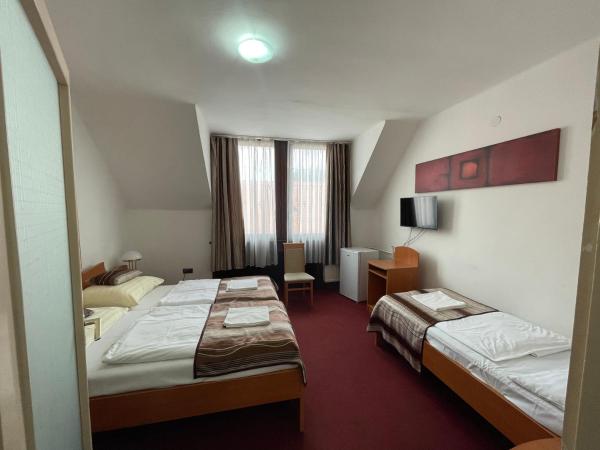 Hotel Minaret&Étterem : photo 1 de la chambre chambre triple