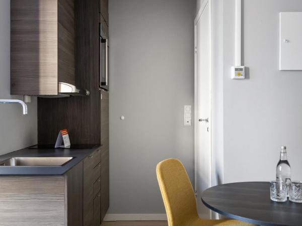 numa l Topp Apartments : photo 6 de la chambre grand studio avec cuisine