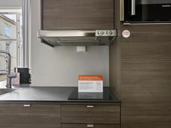 numa l Topp Apartments : photo 3 de la chambre grand studio avec cuisine