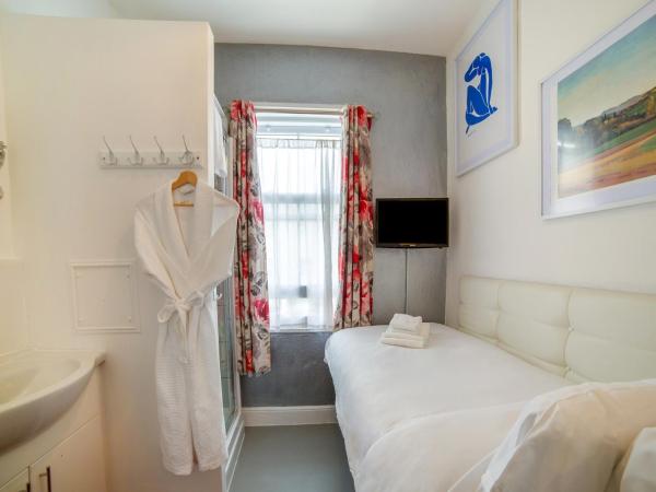 Blue Sky Guest House : photo 2 de la chambre chambre simple avec toilettes communes