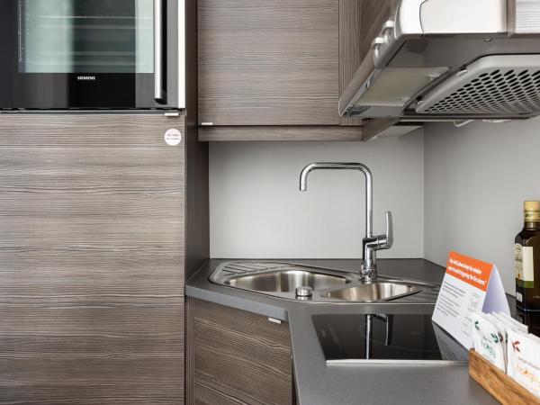 numa l Topp Apartments : photo 6 de la chambre 1 bedroom apartment with balcony and sofa bed