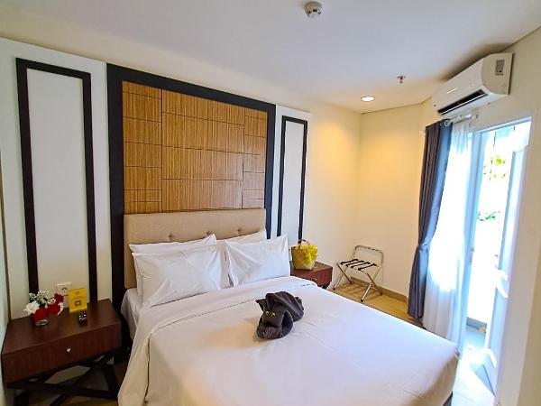 Zia Sanno Menteng Residences- Jakarta : photo 1 de la chambre chambre supérieure lit queen-size