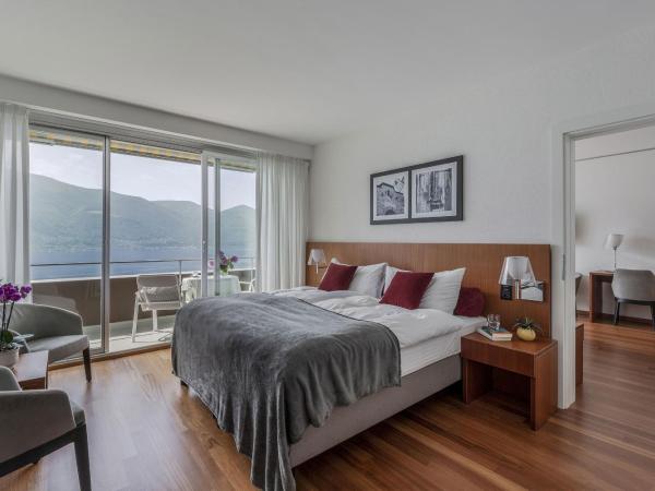 Casa Berno Panorama Resort : photo 3 de la chambre appartement familial moderne avec balcon et vue sur le lac