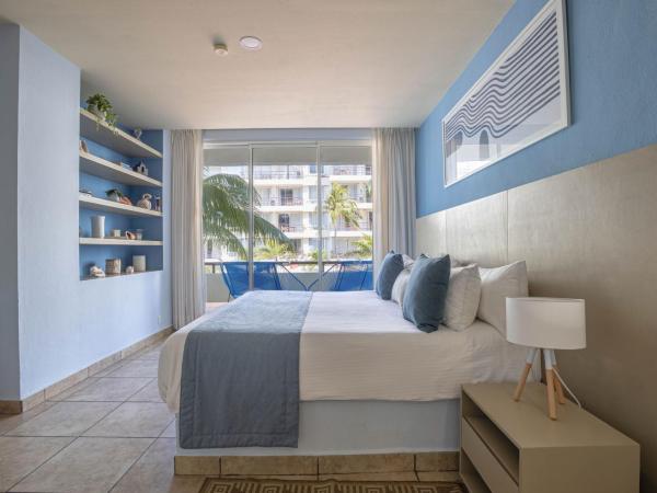 Ixchel Beach Hotel : photo 3 de la chambre suite 1 chambre avec vue sur l'océan ou le jardin