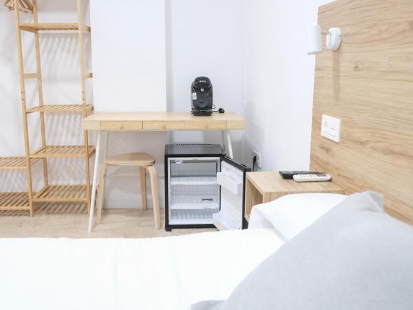 Urban Rooms Alicante : photo 3 de la chambre chambre quadruple avec salle de bains commune