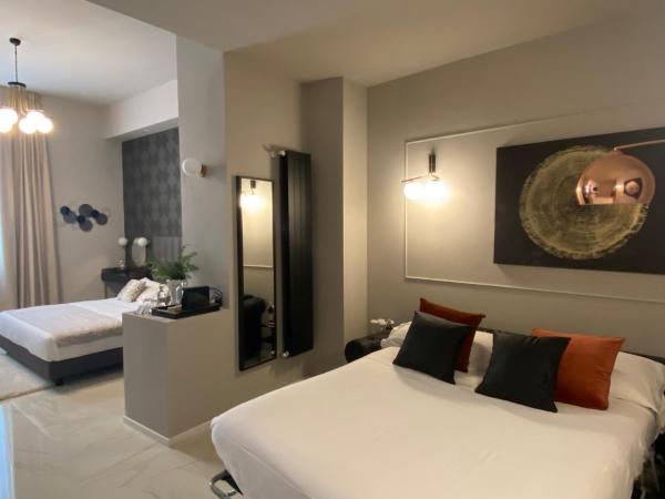 INTOMILAN Galleria Duomo I Boutique & Design Aparthotel : photo 5 de la chambre suite deluxe avec lit king-size