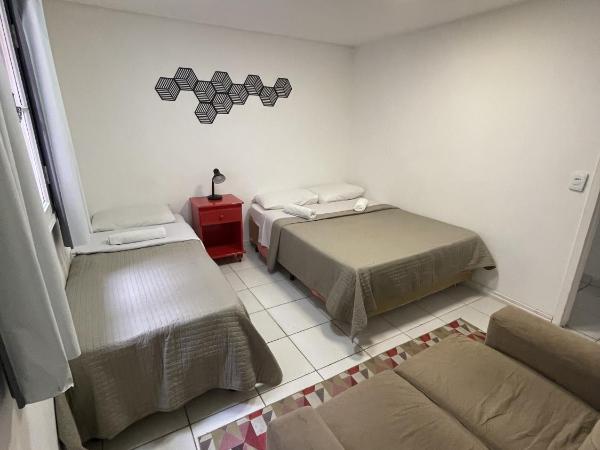 Social Hostel Café e Bar : photo 1 de la chambre chambre triple basique avec salle de bains commune