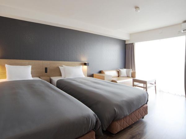 Sakura Terrace The Gallery : photo 1 de la chambre chambre lits jumeaux deluxe avec balcon - aile nord