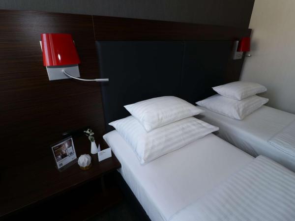 Best Western Plus Plaza Hotel Graz : photo 2 de la chambre chambre lits jumeaux standard