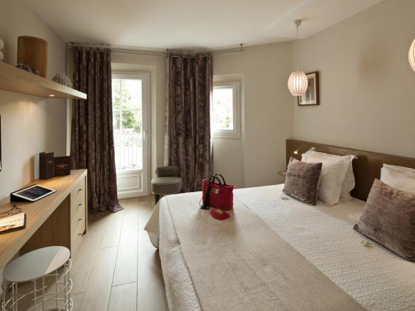 Hotel des Lices : photo 2 de la chambre chambre double ou lits jumeaux standard - vue sur la rue