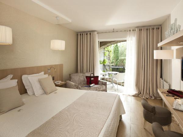 Hotel des Lices : photo 1 de la chambre chambre double ou lits jumeaux deluxe – vue sur jardin