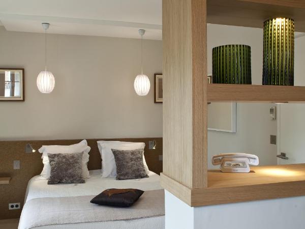 Hotel des Lices : photo 4 de la chambre chambre triple deluxe - vue sur rue