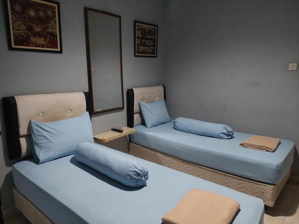 Pondok Seruni Kemanggisan Jakarta : photo 3 de la chambre chambre lits jumeaux standard