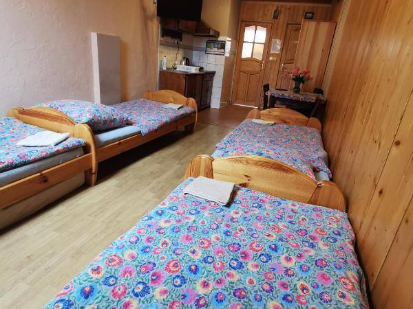 NOCLEGI POD STODOŁĄ : photo 2 de la chambre chambre quadruple