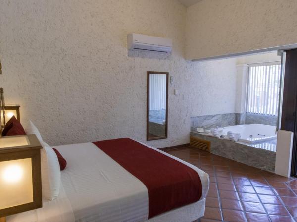 Hosteria Las Quintas Hotel Restaurante Bar : photo 7 de la chambre suite lit king-size avec baignoire spa