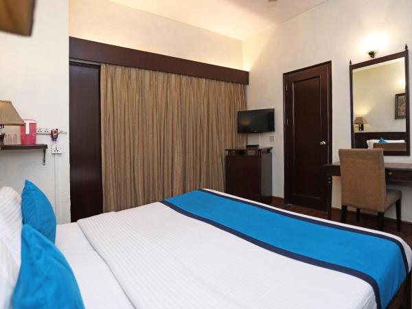 Super Collection O Hamilton Hotel : photo 3 de la chambre chambre triple classique