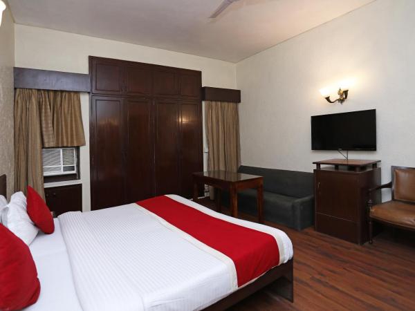 Super Collection O Hamilton Hotel : photo 1 de la chambre chambre triple classique