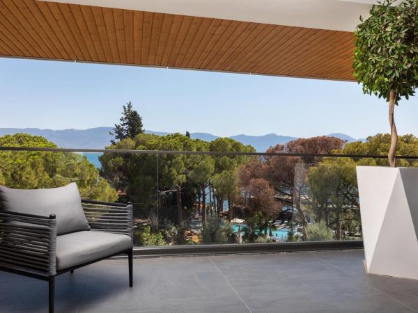 Unique Life Style Hotel : photo 3 de la chambre suite lit king-size - vue sur mer