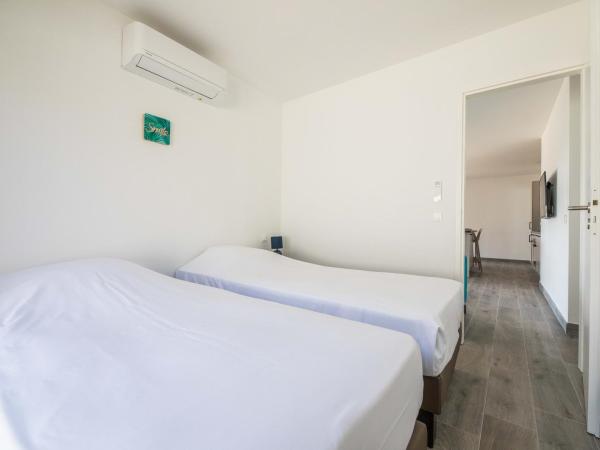 Résidence Pierre & Vacances Premium Les Terrasses d'Arsella : photo 2 de la chambre maison 3 chambres avec climatisation, piscine privée de 7 mètres et jardin (6 adultes)