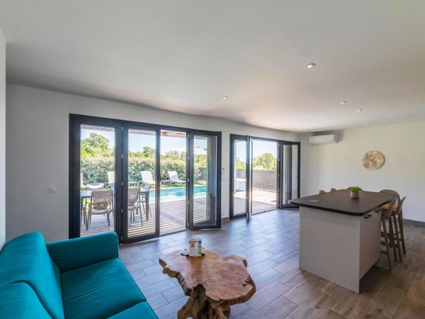Résidence Pierre & Vacances Premium Les Terrasses d'Arsella : photo 6 de la chambre maison 3 chambres avec climatisation, piscine privée de 7 mètres et jardin (6 adultes)
