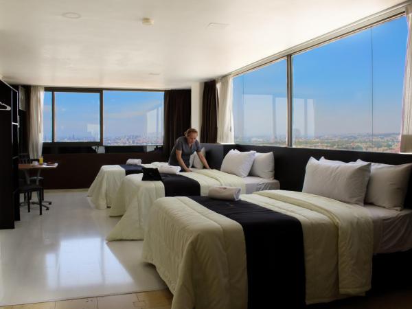 Puebla Inn Express : photo 5 de la chambre chambre triple