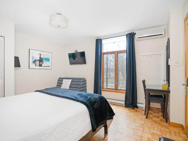 Accueil Chez Francois : photo 9 de la chambre chambre double ou lits jumeaux deluxe – vue sur jardin