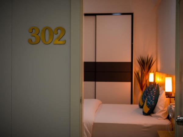 Tourist Inn Grand : photo 10 de la chambre chambre double supérieure