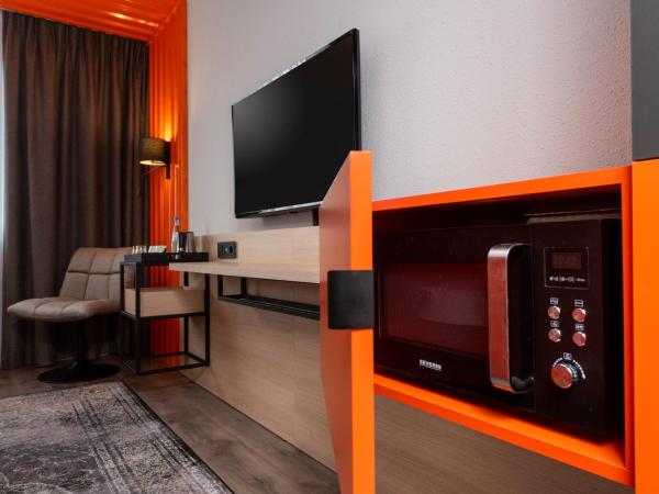 ibis Styles Berlin Treptow : photo 4 de la chambre chambre lits jumeaux supérieure avec kitchenette