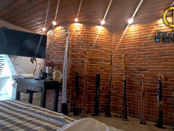 Hotel Temático Casa Puebla : photo 1 de la chambre chambre lit king-size - vue sur montagne