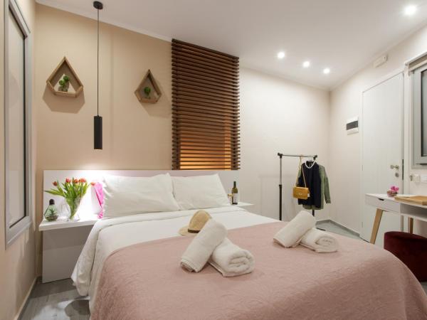 Mitos mini suites : photo 4 de la chambre chambre triple avec salle de bains