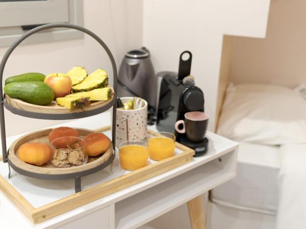 Mitos mini suites : photo 6 de la chambre chambre triple avec salle de bains