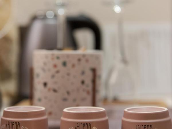 Mitos mini suites : photo 7 de la chambre chambre triple avec salle de bains privative