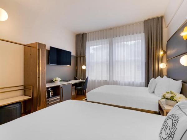 Hotel Gibbs Downtown Riverwalk : photo 3 de la chambre chambre avec 2 grands lits queen-size