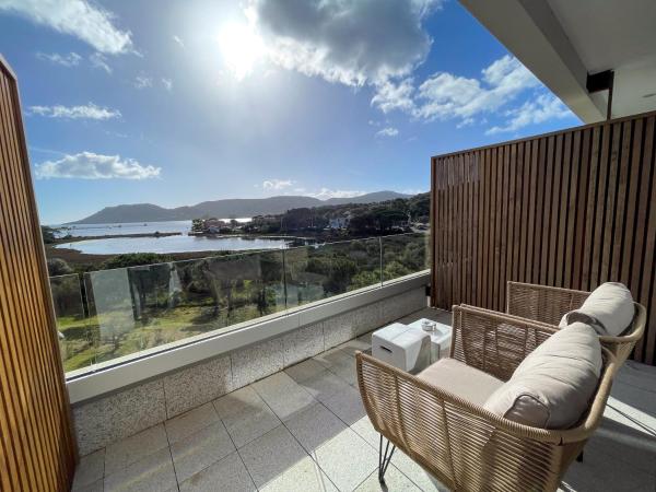 Golden Tulip Porto-Vecchio : photo 2 de la chambre chambre lit king-size deluxe - vue sur mer