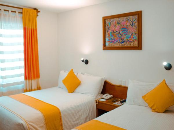 Hotel Oaxaca Real : photo 1 de la chambre chambre intérieure avec 2 lits doubles