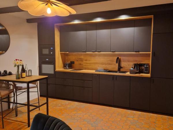 Au Moulin Saint Nicol - Honfleur : photo 2 de la chambre chambre 1 : suite junior climatisée - accès à la terrasse