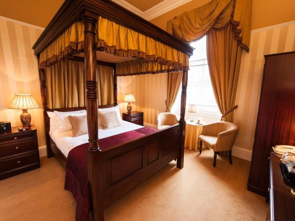 Kildonan Lodge Hotel : photo 6 de la chambre chambre supérieure avec lit à baldaquin