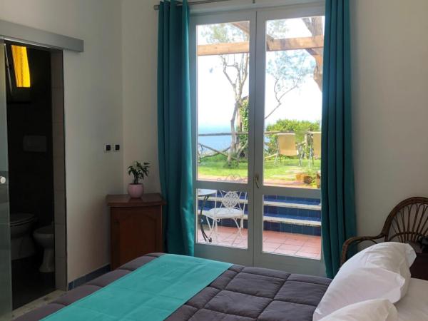 Villa Giovanna : photo 1 de la chambre chambre double ou lits jumeaux - vue sur mer