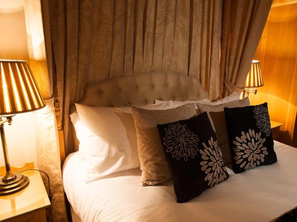 Kildonan Lodge Hotel : photo 4 de la chambre chambre double avec lit à baldaquin