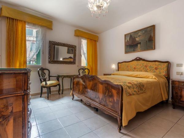 Hotel Casa Boccassini : photo 4 de la chambre chambre double ou lits jumeaux - vue sur jardin