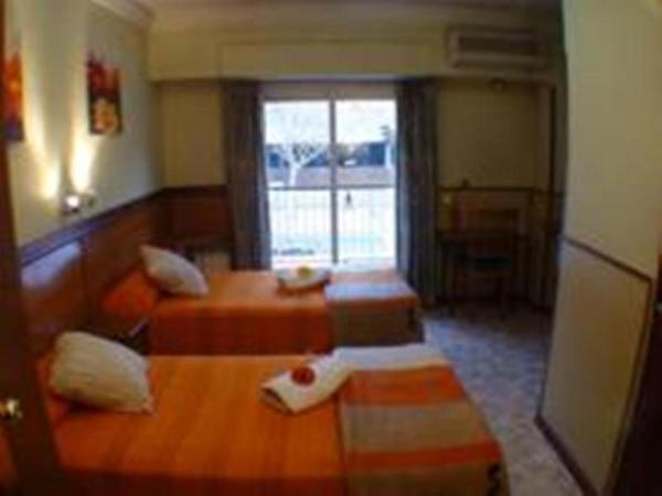 Hostal El Carmen : photo 1 de la chambre chambre double ou lits jumeaux