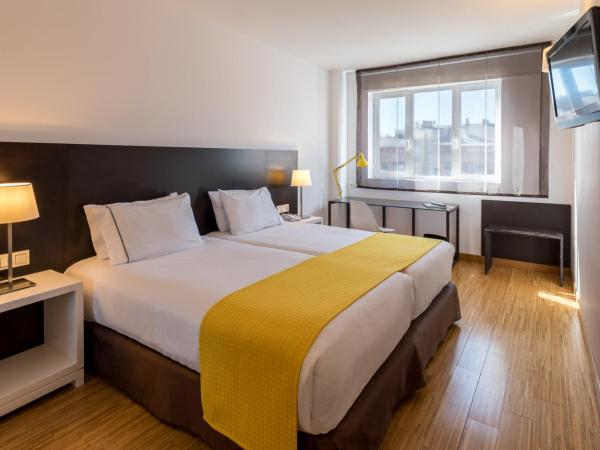 Rafaelhoteles Atocha : photo 3 de la chambre chambre double ou lits jumeaux avec lit d'appoint (2 adultes + 1 enfant)