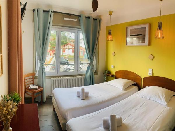 Hotel Bistrot FINE : photo 1 de la chambre chambre lits jumeaux - vue sur ville