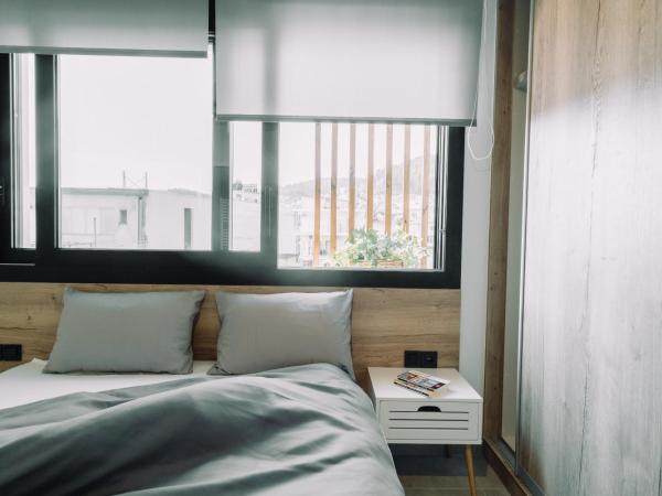 Comninon Suites : photo 5 de la chambre appartement avec balcon