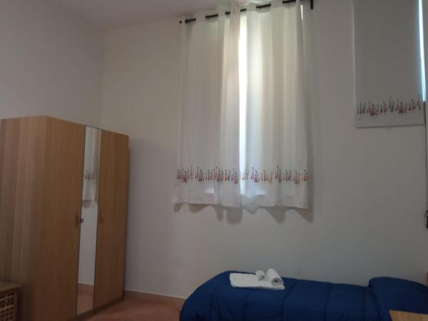 Beteyà Hostel Don Bosco : photo 3 de la chambre chambre triple - accessible aux personnes à mobilité réduite