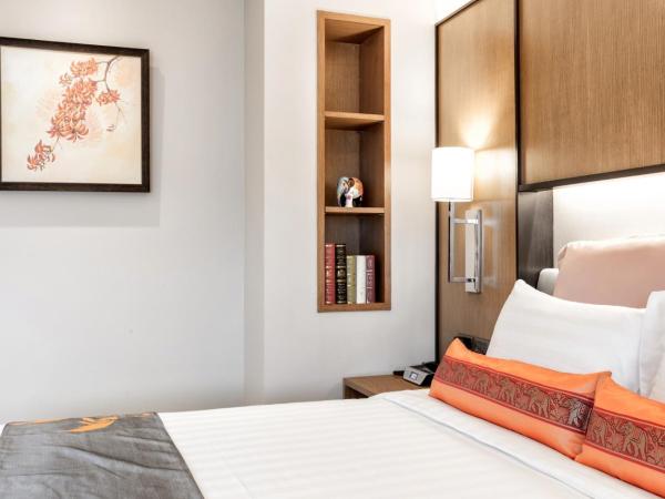 Jomkitti Boutique Hotel : photo 1 de la chambre chambre lit king-size de luxe avec balcon