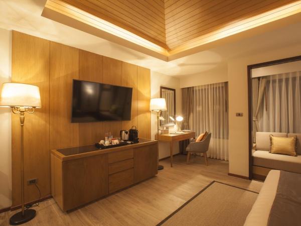 Jomkitti Boutique Hotel : photo 4 de la chambre suite exécutive avec banquette-lit