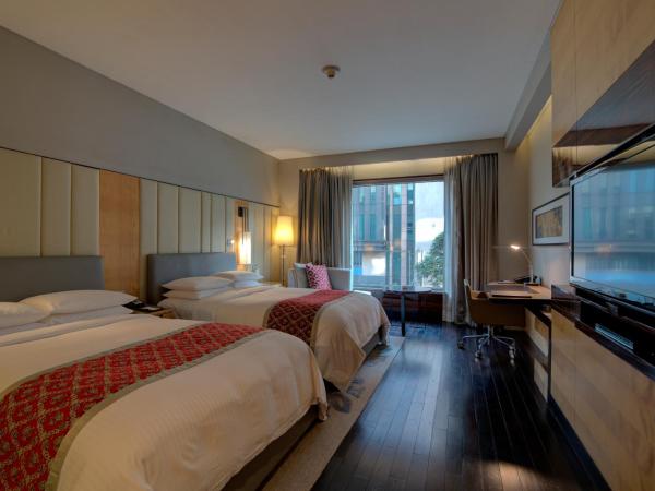 JW Marriott Hotel New Delhi Aerocity : photo 5 de la chambre chambre deluxe 2 lits doubles 