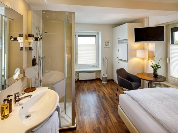 Aparthotel Familie Hugenschmidt : photo 3 de la chambre chambre simple classique avec douche et toilettes